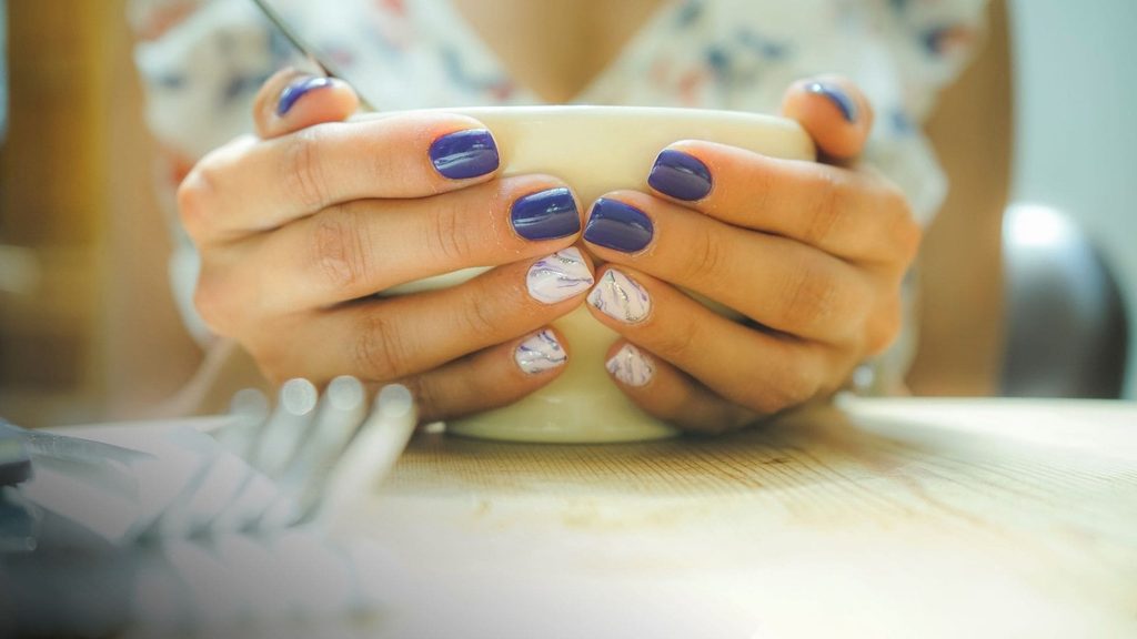 Cat Eye Nails: Everything You Need to Know in 2026 4 navy blue manicure with cat eye nail design