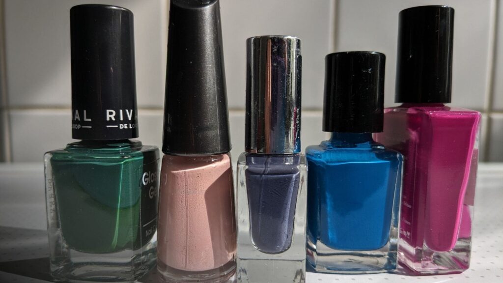 Cat Eye Nails: Everything You Need to Know in 2026 3 collection of nail polish bottles including cat eye nails varnish shades
