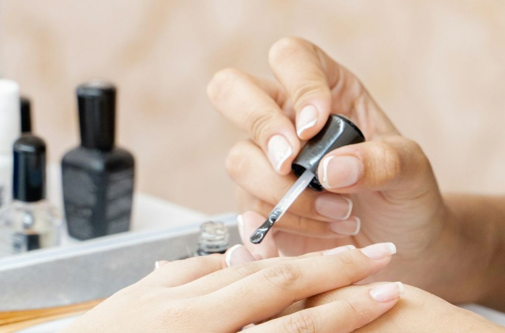 How to Make Nail Art Last Longer Without Chipping or Peeling 2 How to Make Nail Art Last Longer by carefully applying nail polish with a brush during a manicure.