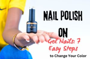 Nail polish on gel nails showing a blue nail polish bottle and manicure guide.