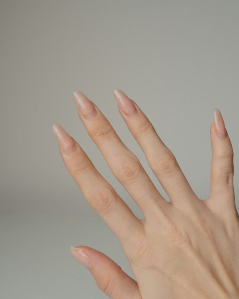 Nail Shapes: 7 Costly Mistakes That Ruin Your Manicure and How to Choose the Right One 3 Natural almond nail shapes with a clean nude manicure